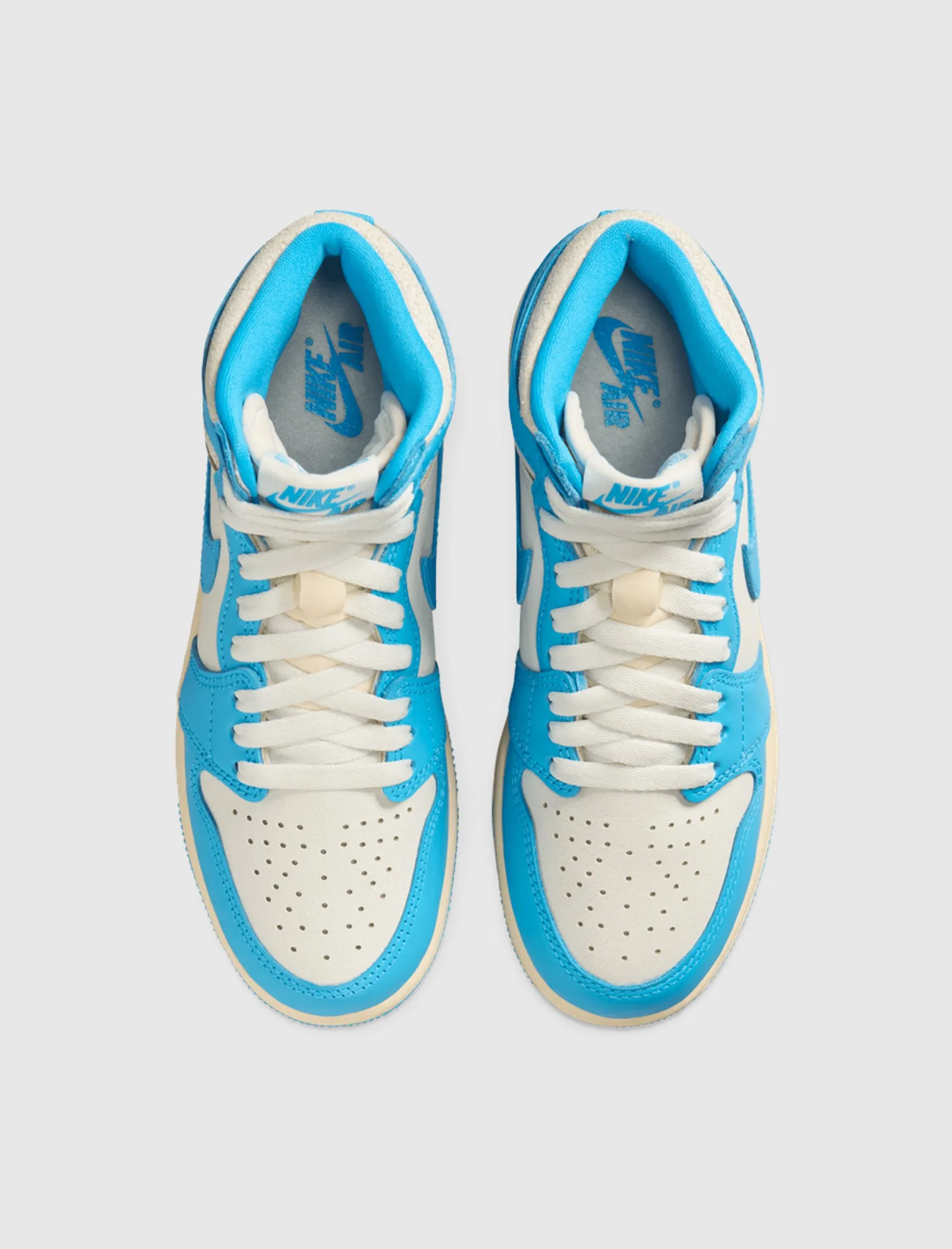 AIR JORDAN 1 HI OG REIMAGINED "UNC" GS Quick Motion Hero Edge